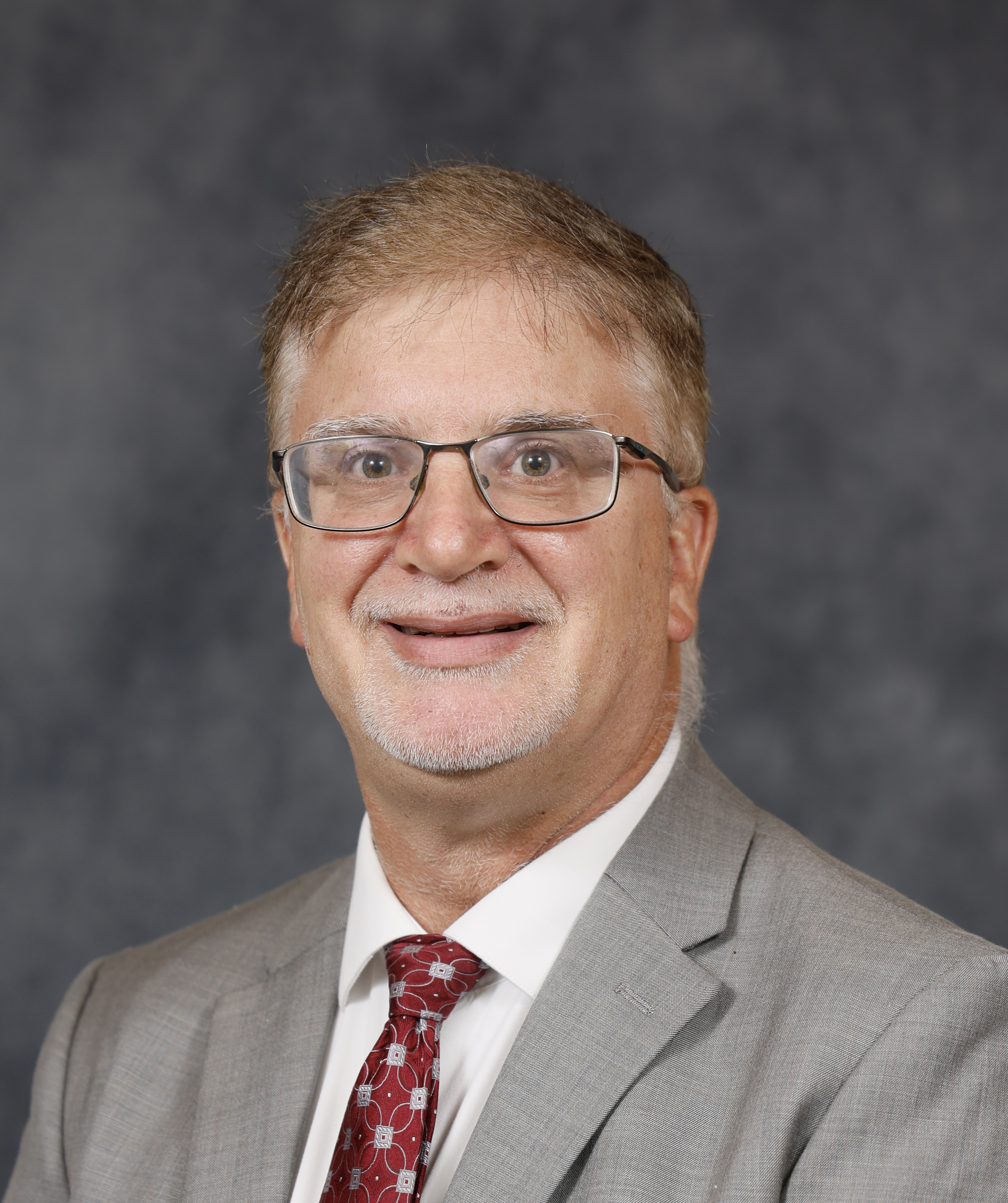 Headshot for Travis Sheffler