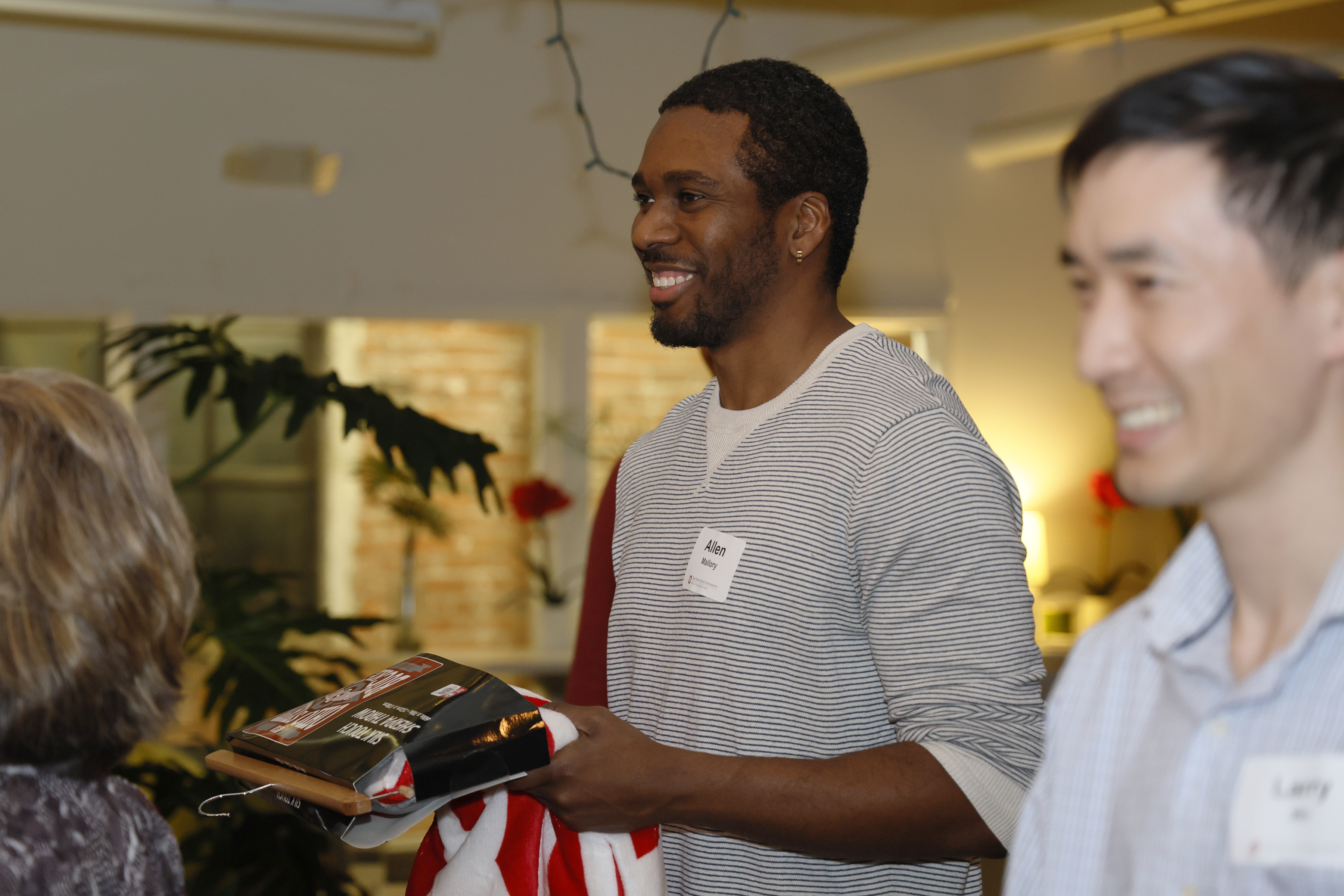Two male faculty at a faculty network gathering.