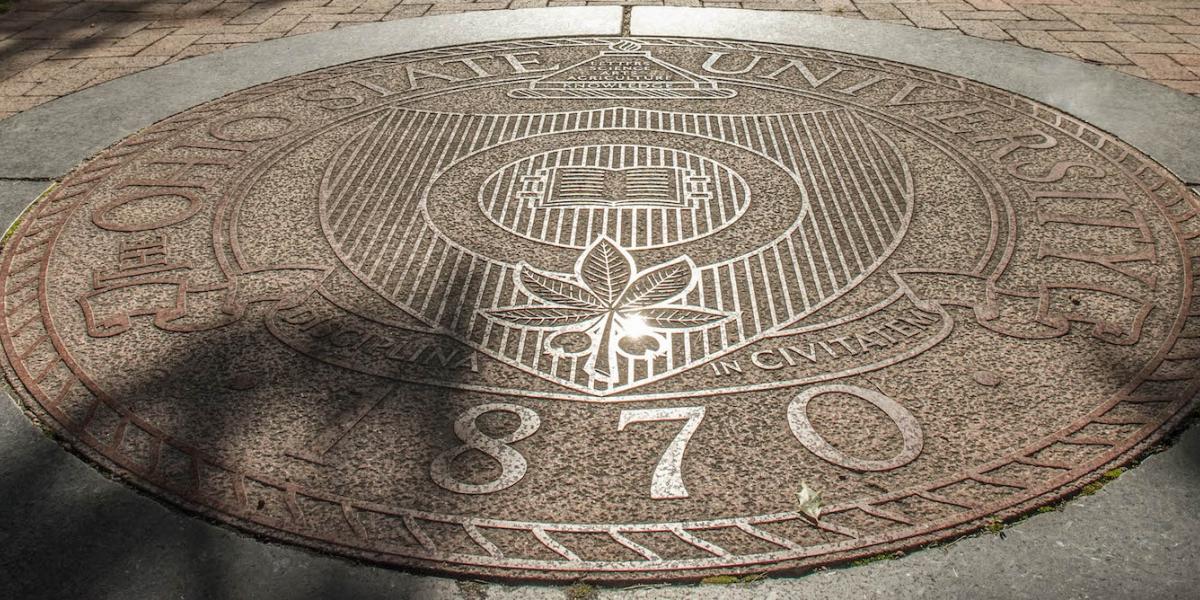 Seal of The Ohio State University in the Oval at Ohio State.