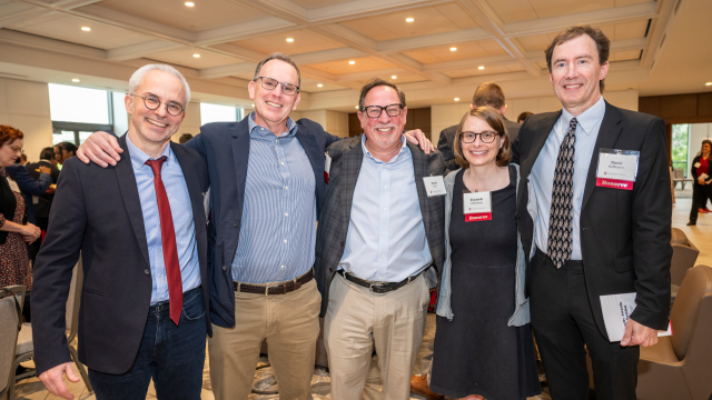 Five faculty members at th awards ceremony